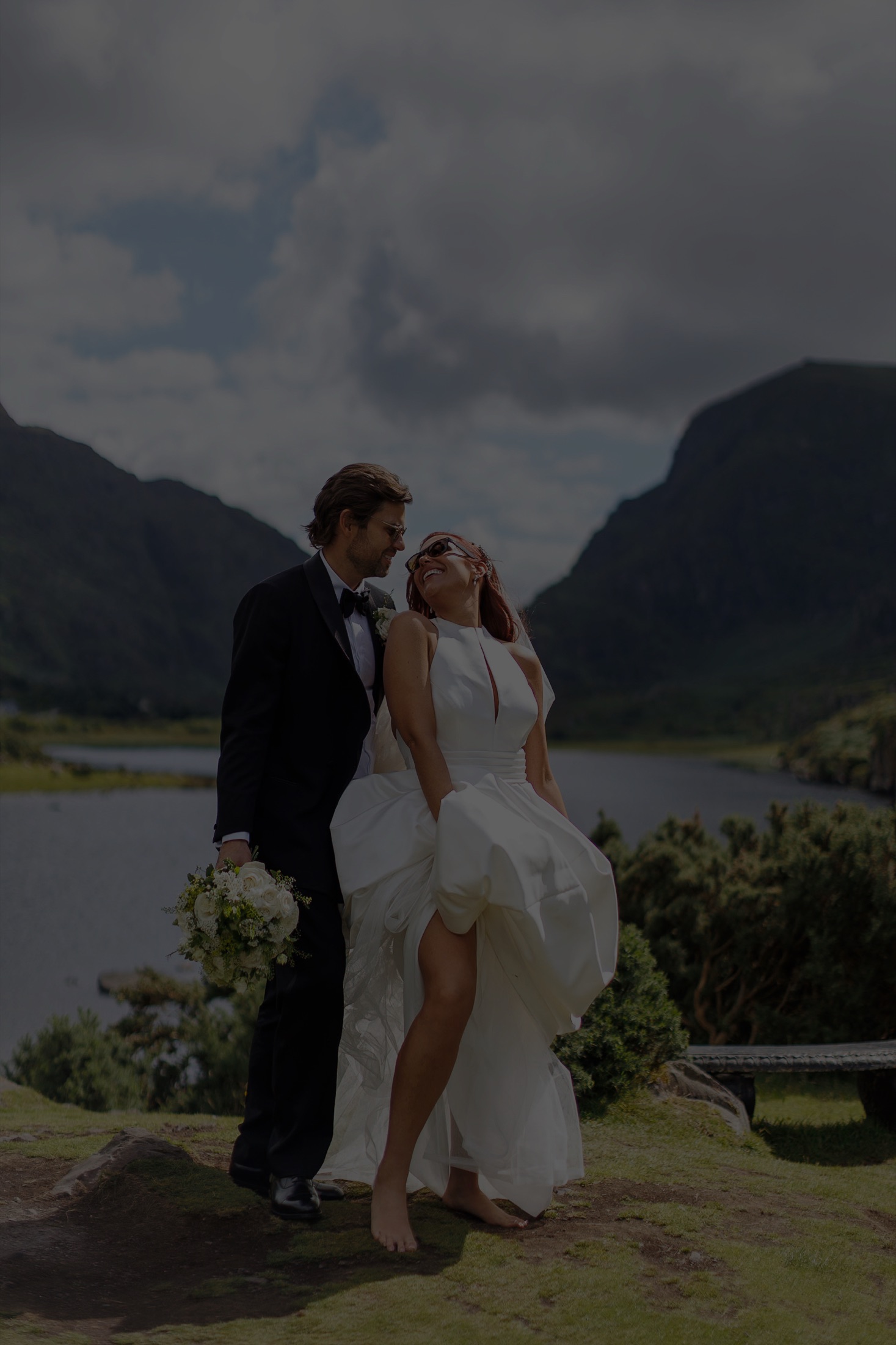 Couple embracing in the mountain landscape of the Gap of Dunloe